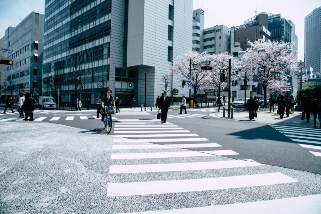 Pedestrians walking across the street