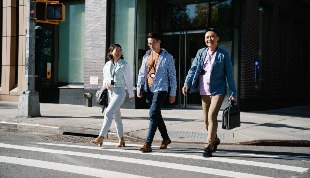 Pedestrians walking across the street